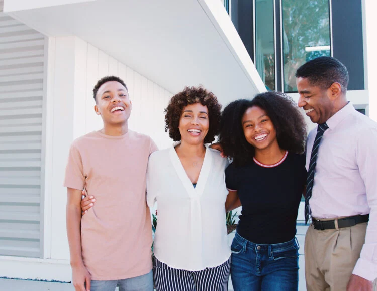 portrait-of-smiling-family-with-older-children-sta-2025-12-15-07-57-27-utc
